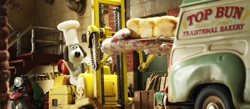 Gromit in a chef's hat while baking bread in 'Wallace and Gromit: A Matter of Loaf and Death'.